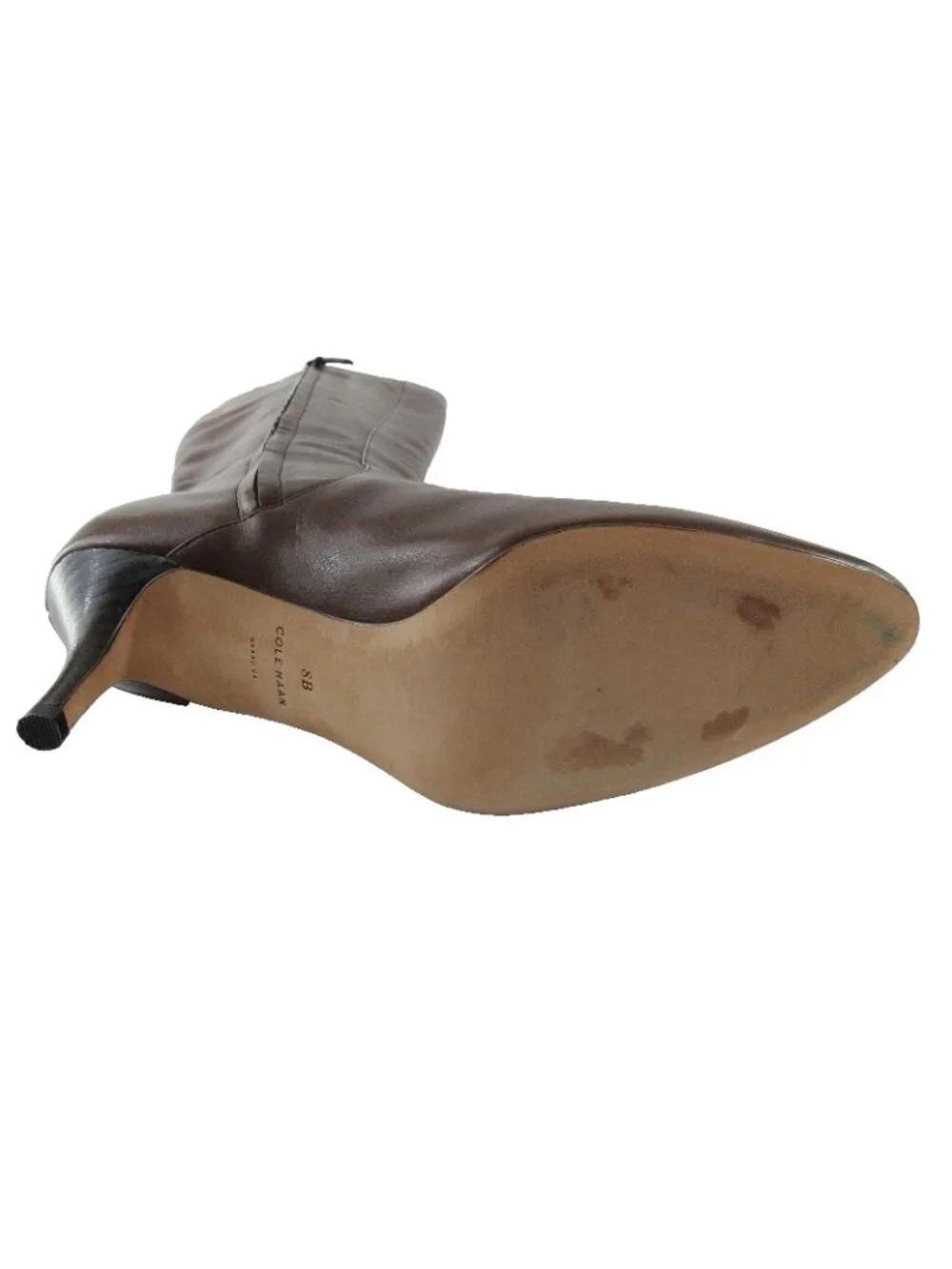 Cole Haan boots shown
